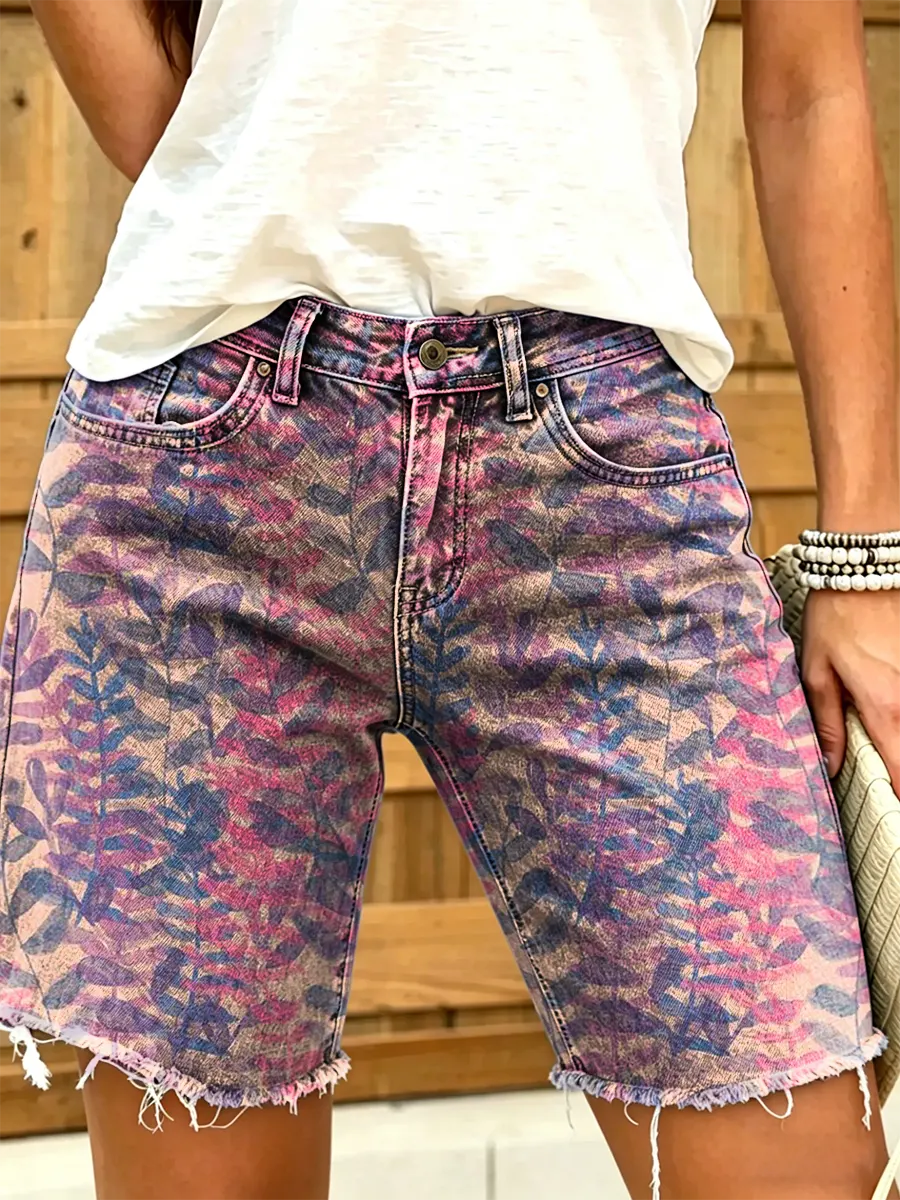 Women's art print denim shorts, adorned with leaf patterns