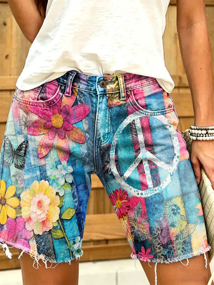 Women's Peace Symbol and Floral Patchwork Print Frayed Denim Shorts