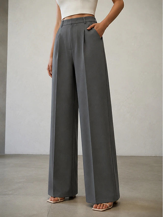 Elegant silhouette with high waist design, suitable for workplace wear in cool seasons.