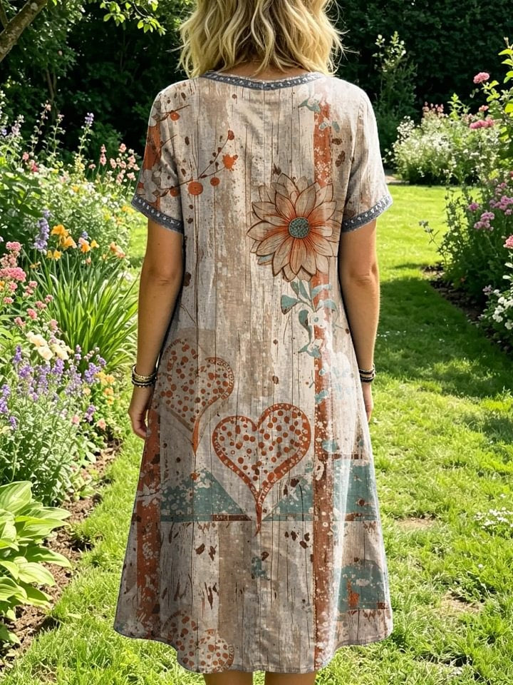 Women's Short-sleeve Round-neck Dress With Artistic Floral Print And Cutout Details